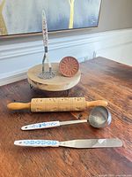 Group shot of all six items on wooden surface