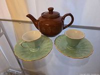Full set: brown teapot, two mint cups, two mint scalloped saucers