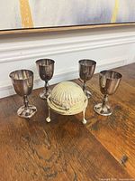 all four goblets with covered condiment dish closed