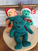 Front view of three holiday Ty Beanie Baby bears