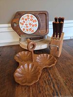 All items grouped: tidbit tray, cutting board with ceramic tile, knife block with knives, cheese board with slicer