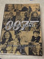 Front of slipcase showing title and montage artwork