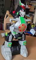 Front view of large Dragonzord figure showing chest detail and articulated limbs