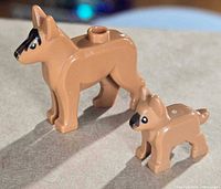 Adult and puppy LEGO German Shepherd figures side view