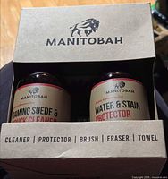Front view of box showing two Manitobah bottles inside