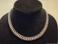 Front view showing three rows of crystals on display form