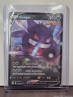 Front of Gengar V card in plastic toploader