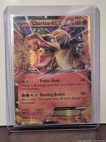 Front of Charizard EX card inside top loader