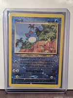 Front of Marill reverse holo card in top loader