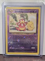 Front view of Slowking card in top loader