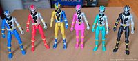 All six Power Rangers figures standing in lineup