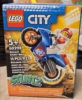 Front of sealed LEGO City Rocket Stunt Bike 60298 box