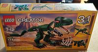 Front of sealed LEGO Creator 31058 box showing T-Rex build