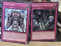 Front view of both cards showing titles, artwork and 1st Edition text