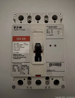 Front view of Eaton EDS3100 circuit breaker showing label, rating, and toggle