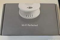 Front of retail box showing product image and Wi-Fi Perfected tagline