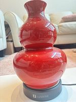 Red glass double-gourd diffuser on Luvaire base