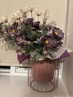 vase with artificial flowers displayed