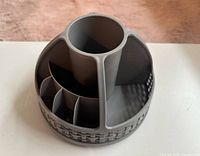 Top view of gray rotating organizer showing compartments
