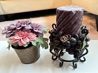 Both candle holder with candle and artificial flower pot