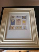 Blue-toned floral print in ivory frame