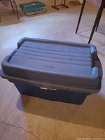 Closed blue storage tote showing overall appearance