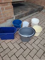 Group shot of all six buckets and pails