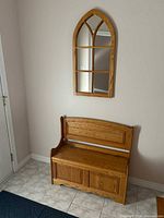 Bench and mirror mounted together showing overall appearance