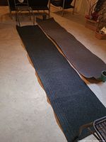 Both runner rugs laid out side by side showing length and color difference