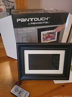 Pandigital PanTouch digital photo frame, remote, original box