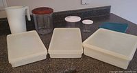 Group shot of all containers and lids on countertop