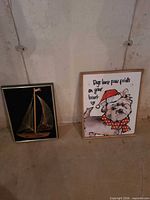 Both framed pieces side by side