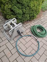 Reel, main hose and lead hose on patio