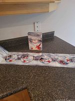 Box set opened showing five discs in fold-out sleeve