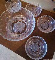 Top view of full 5-piece pressed glass bowl set