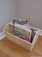 Magazine holder filled with assorted magazines