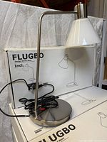 Assembled Flugbo lamp in front of original box