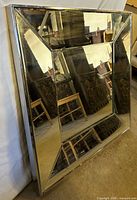 Front angled view of square multi-panel beveled mirror