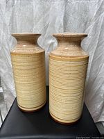 Front view of both pottery lamp bases standing upright