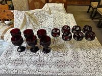 Full set of 14 goblets on table