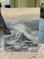 Canvas painting depicting crashing wave with rock, signature visible