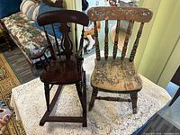 Both children's chairs side by side on table