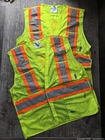 Two Viking hi-vis vests laid flat showing front and reflective stripes