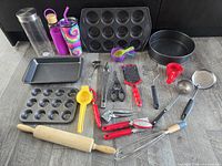 All bakeware, utensils and bottles laid out