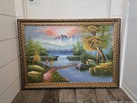 Full view of framed oil landscape painting
