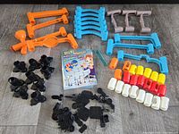 Full layout of marble run pieces and leaflet