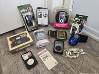 Group shot of all boxed and loose accessories on floor