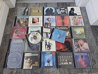 All 20 CDs laid out in four-row grid