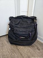 Front view of pannier showing Norco logo and pocket layout