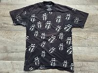 Front view of T-shirt showing all-over logo print